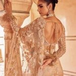 Glamorous Golden-Toned Sequined Net Saree - Mocna
